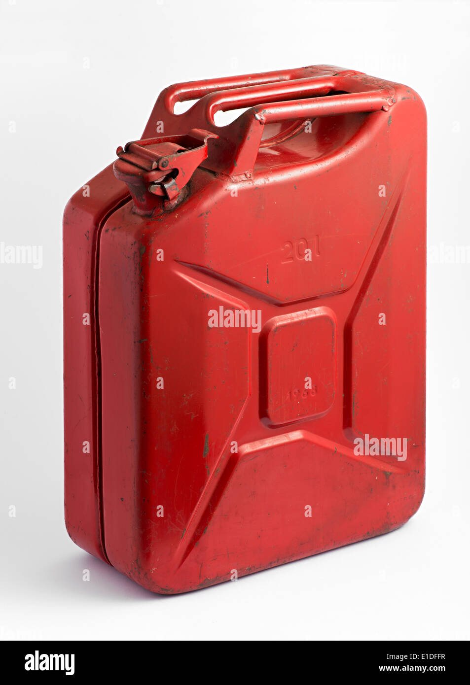 Red metal fuel tank or jerry can for transporting and storing gasoline