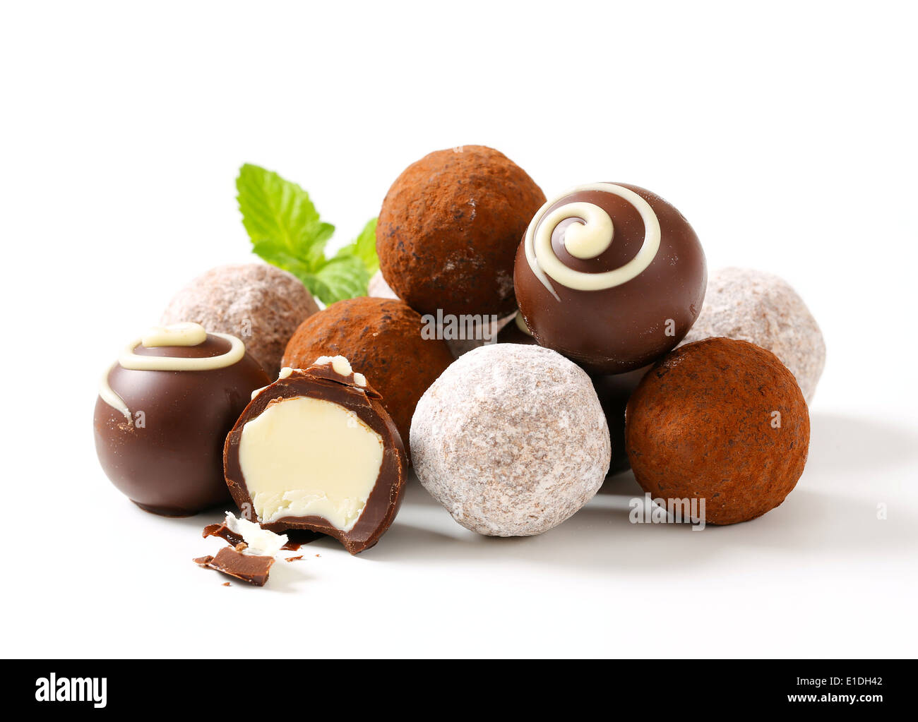 Assorted chocolate truffles and pralines with ganache filling Stock