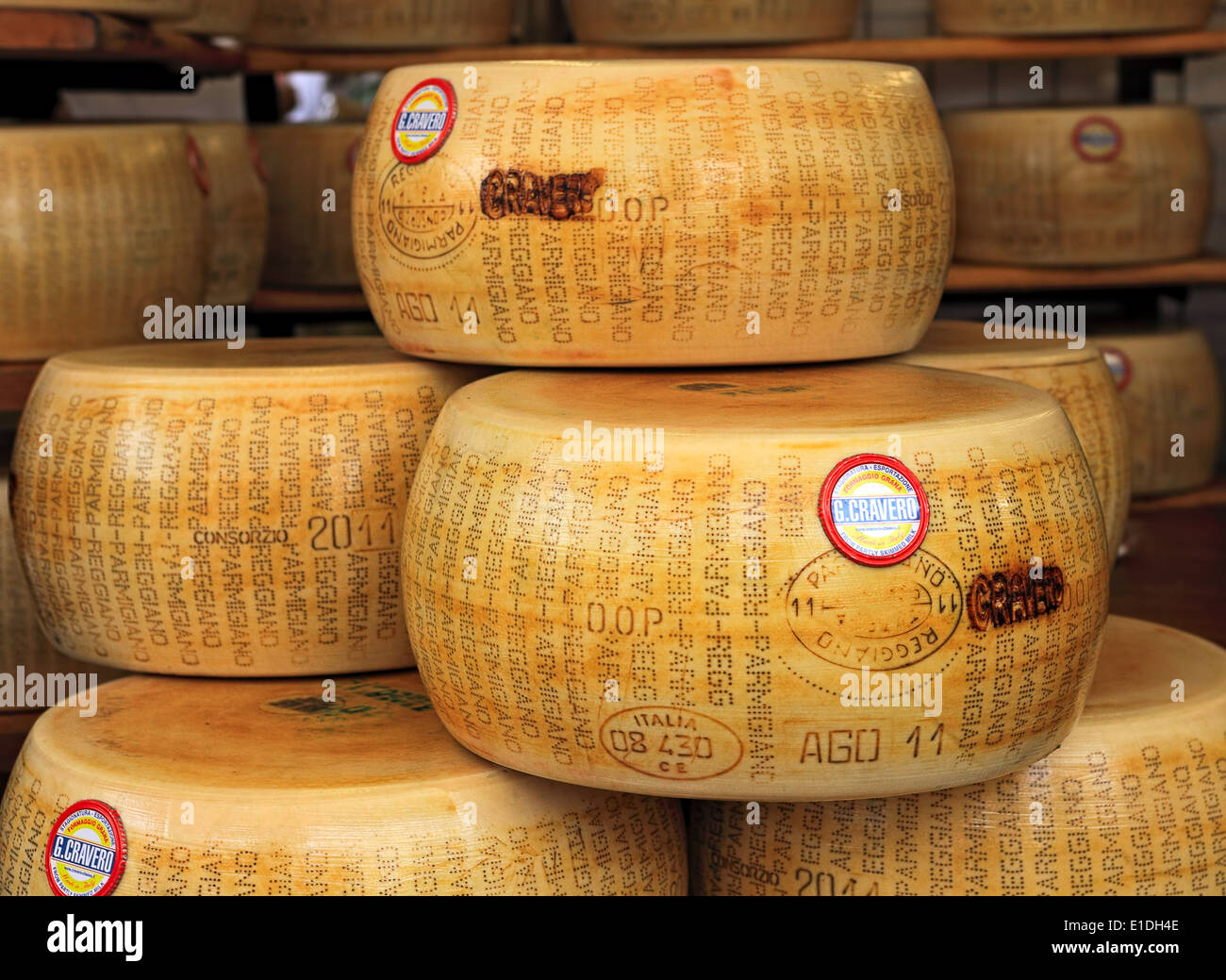 Wheels of Parmesan cheese on the market in Italy. Stock Photo