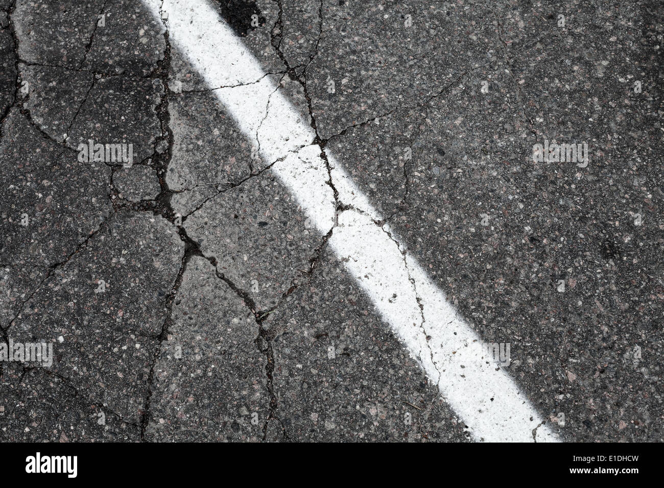 Old asphalt road with white dividing line, background texture Stock Photo