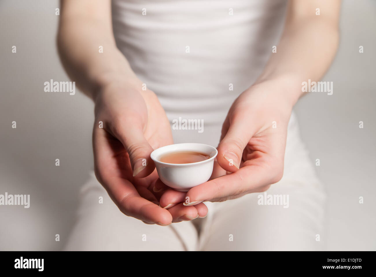 Chinese tea ceremony is perfomed by tea master in kimono Stock Photo
