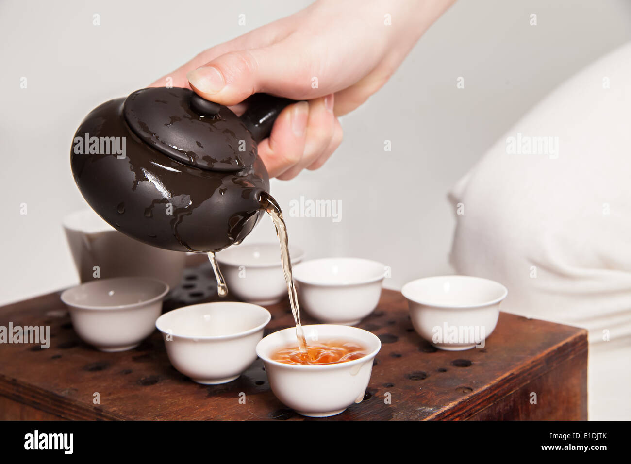 Chinese tea ceremony is perfomed by tea master in kimono Stock Photo