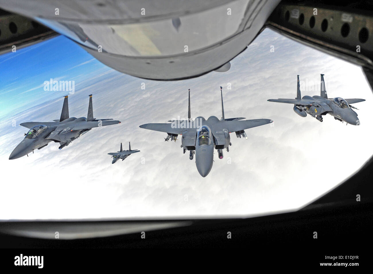 US Air Force pilot Col. Jeannie Leavitt, 4th Fighter Wing commander, approaches to refuel with fellow F-15E Strike Eagle fighter pilots on her final flight in command May 29, 2014 over North Carolina. Stock Photo