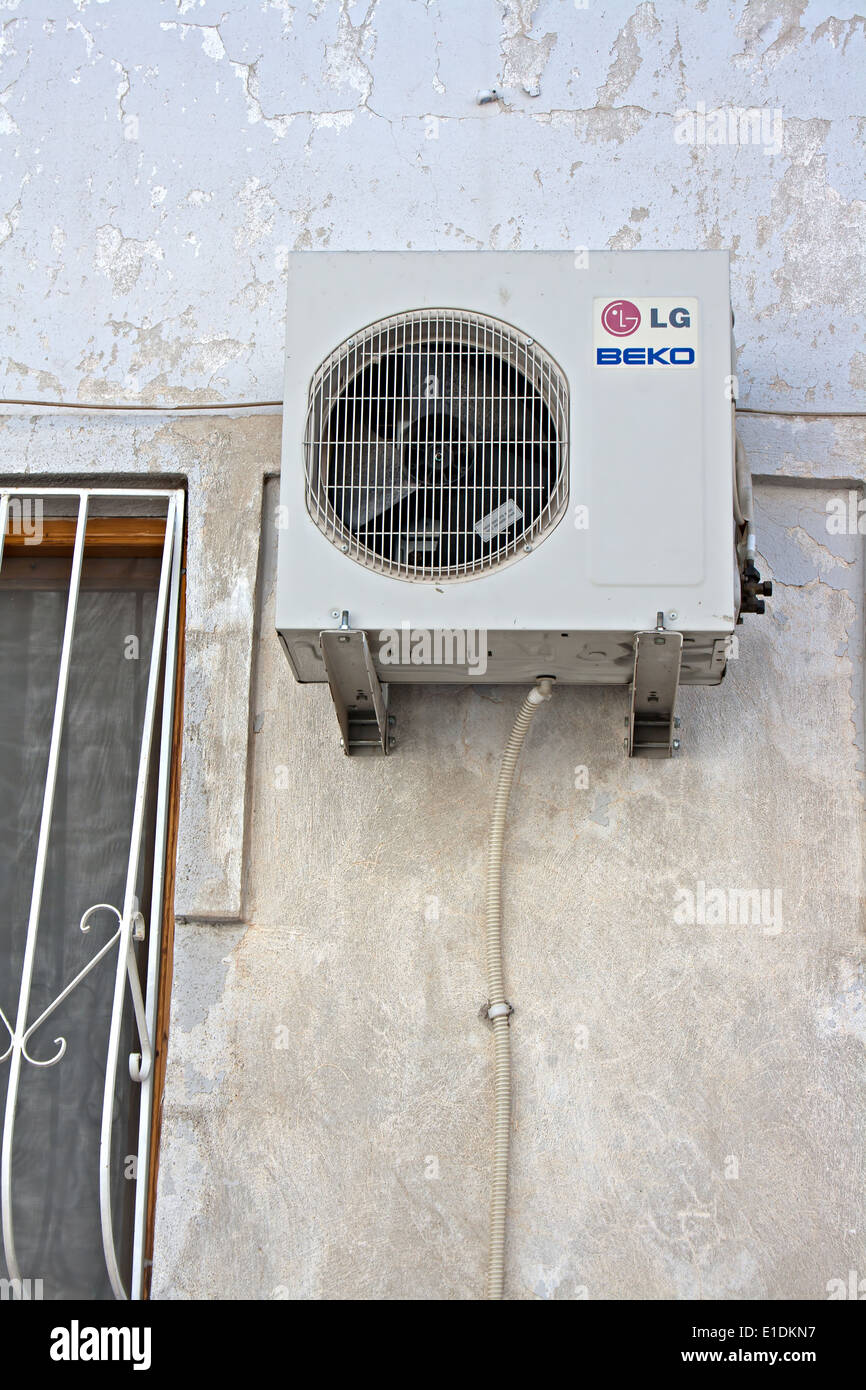 LG Beko air conditioning unit on old village house Stock Photo - Alamy