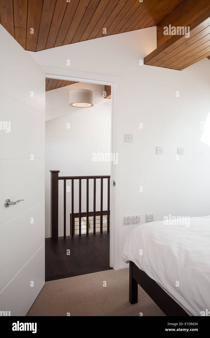 Converted Attic Bedroom In Modern Home London Uk Stock