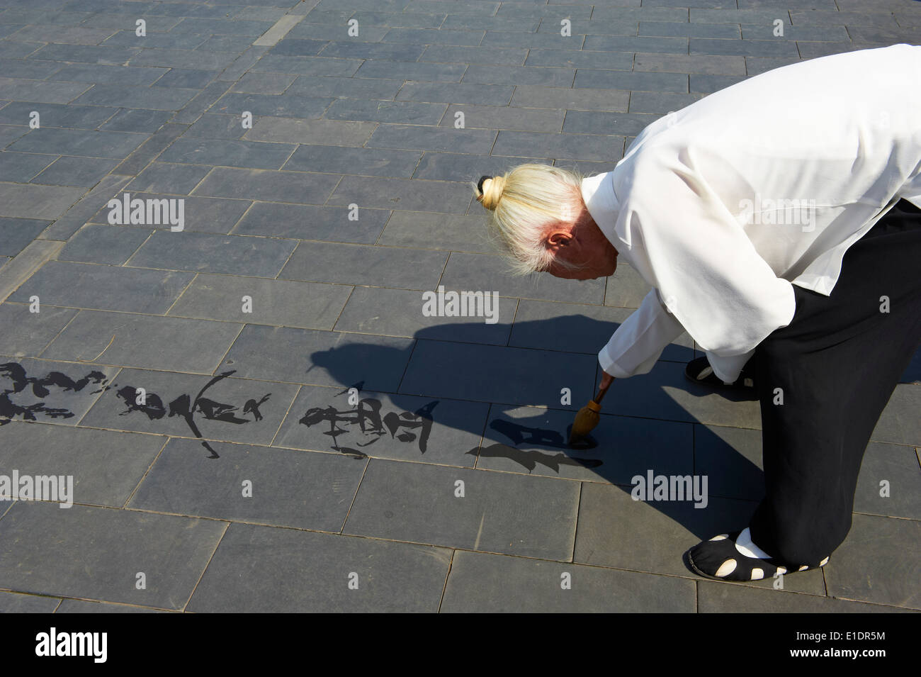 China, Beijing, Calligraphy exercice at Beihai park Stock Photo