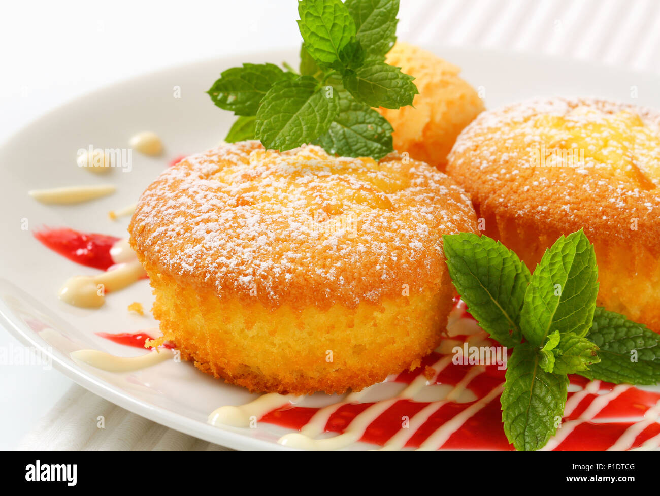 Custard filled muffins with scoop of ice cream Stock Photo Alamy