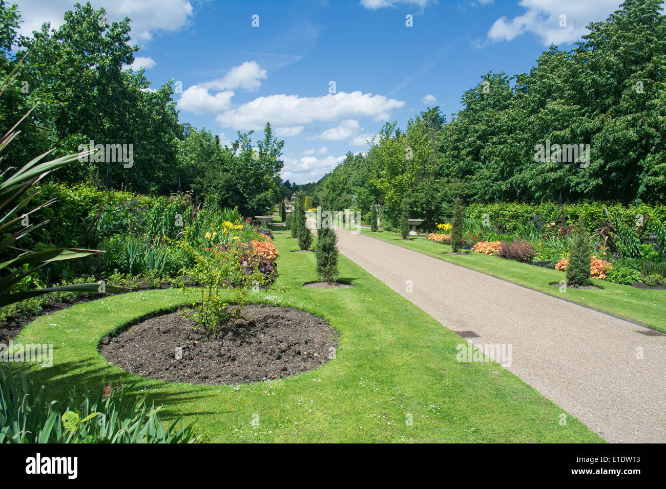 Flower beds and walkway in Regents Park, London Stock Photo