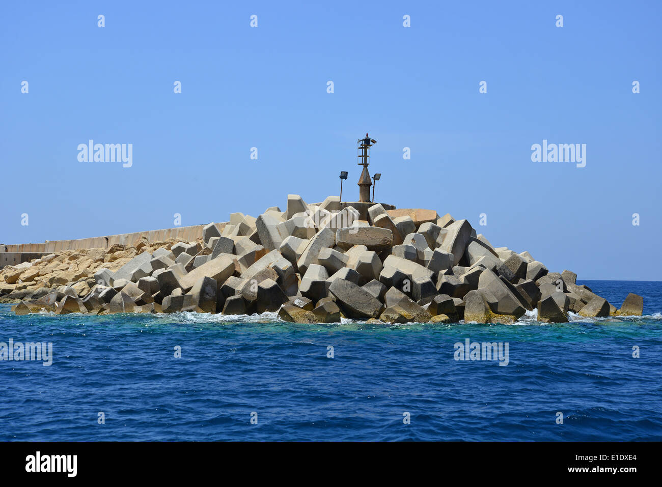 Concrete block waterbreak, Cirkewwa Ferry Terminal, Paradise Bay, Northern District, Malta Majjistral Region, Republic of Malta Stock Photo