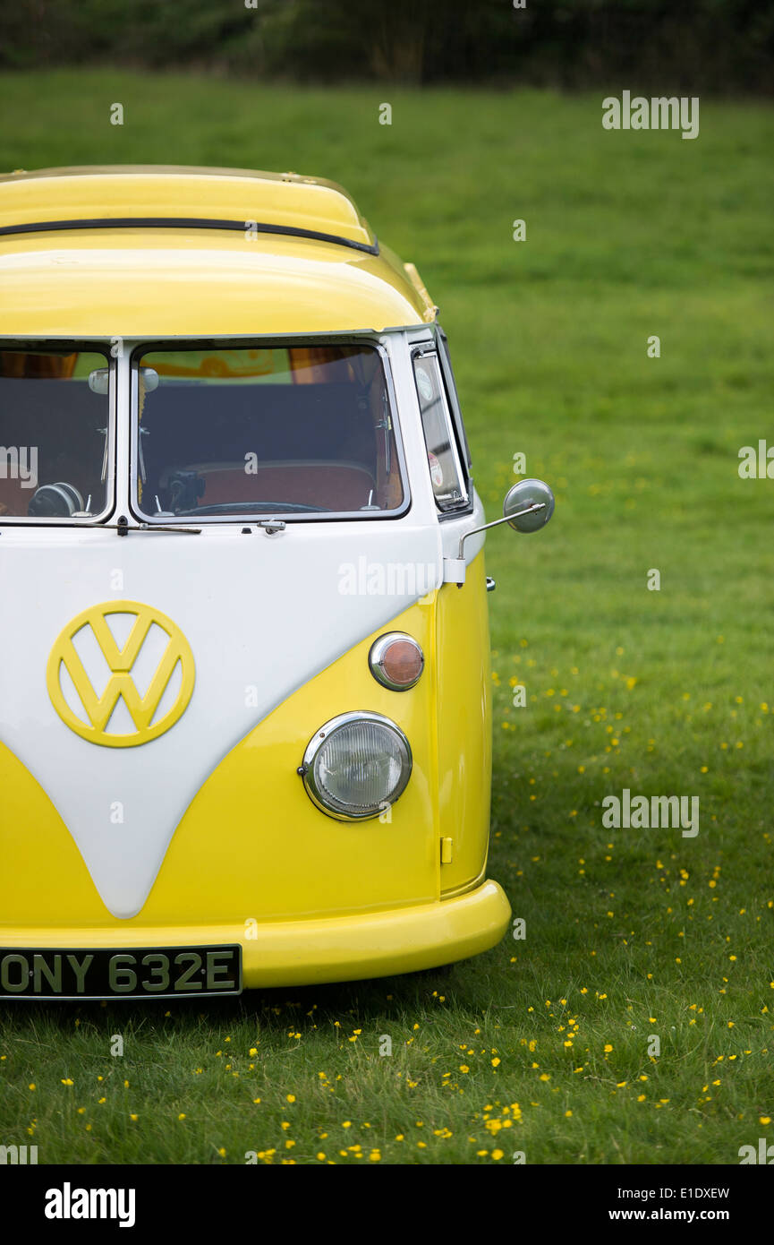 1967 Yellow white VW Split Screen Volkswagen camper van in a field. England Stock Photo