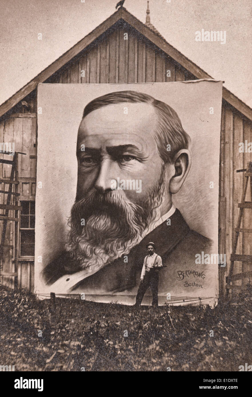 Enormous painting of President Benjamin Harrison displayed on the side of a barn with the artist standing next to it. The artist signed the portrait 'Berthrong Boston.' Stock Photo