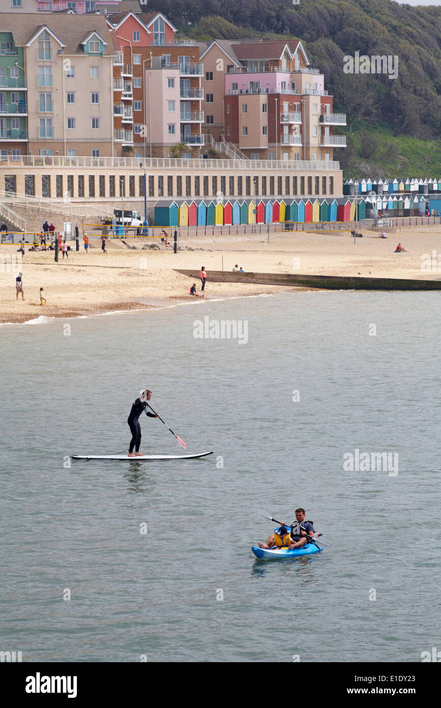 Paddleboarding and kayaking at Boscombe beach with The Overstrand in the distance in June. Credit:  Carolyn Jenkins/Alamy Live News Stock Photo