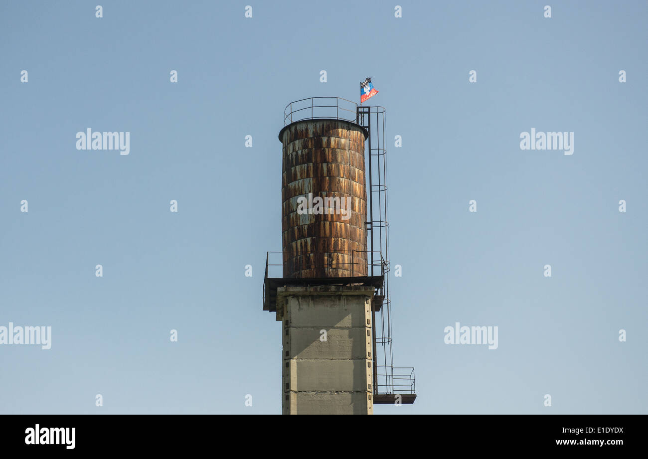 so called Donetsk People's Republic flag on some kind of tower in Donetsk oblast during 2014 Pro-Russian conflict in Ukraine Stock Photo