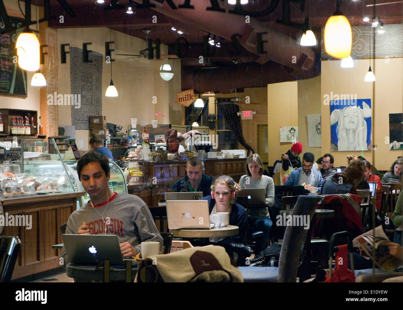 Young people use their computers at a cafe in Madison, Wisconsin Stock Photo