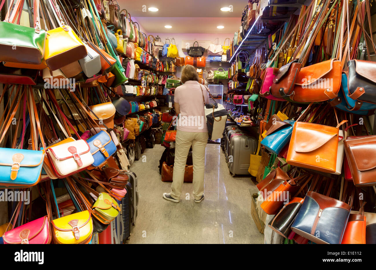 People shopping for handbags in a leather goods store shop, Rome Stock ...