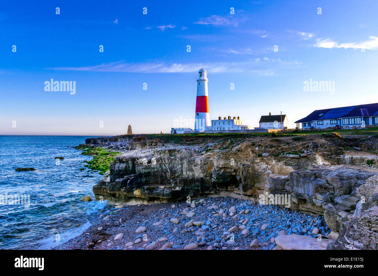 Portland Lighthouse with cliffs in foreground Stock Photo