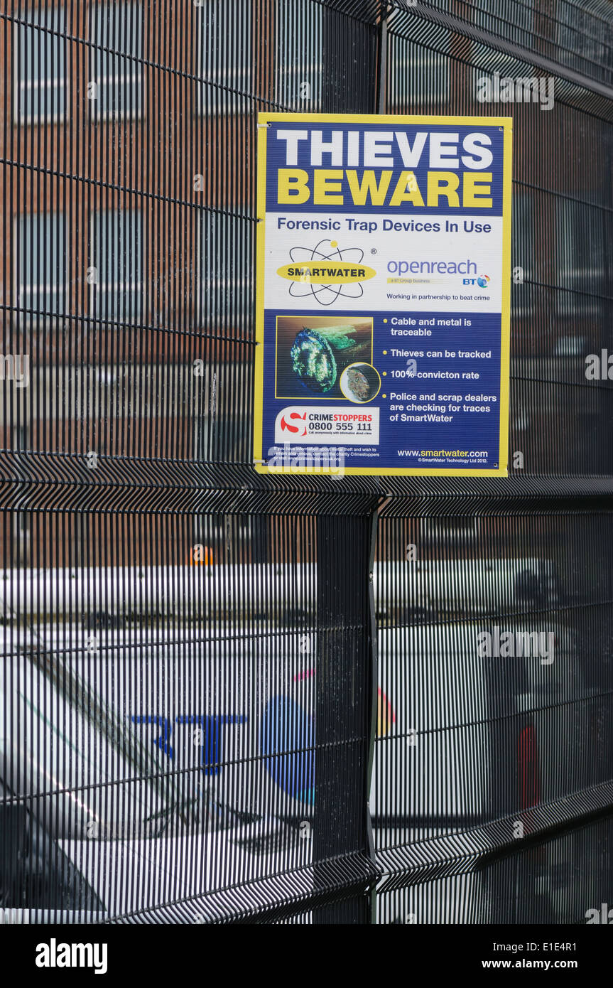 Sign at a BT depot advising thieves that Smartwater is in use to prevent cable theft Stock Photo