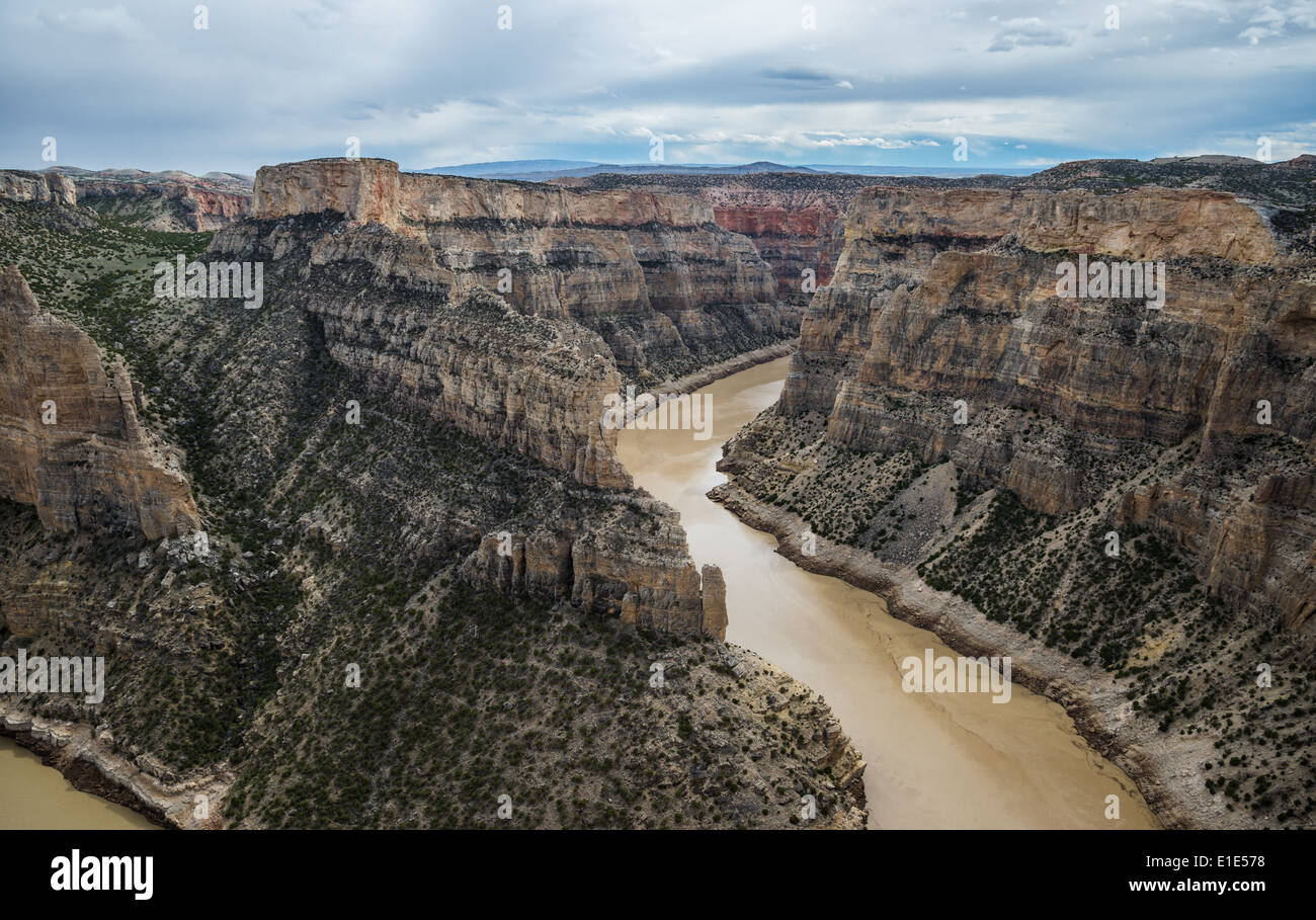 A deep canyon cut into rock formation by flowing river. Wyoming, USA. Stock Photo