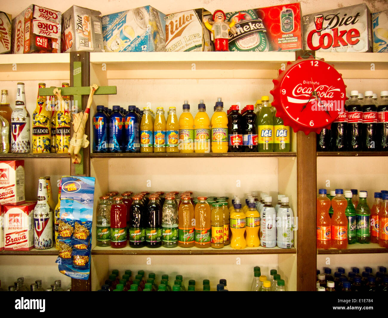 bottles of beverages on shelves in a shop Stock Photo - Alamy