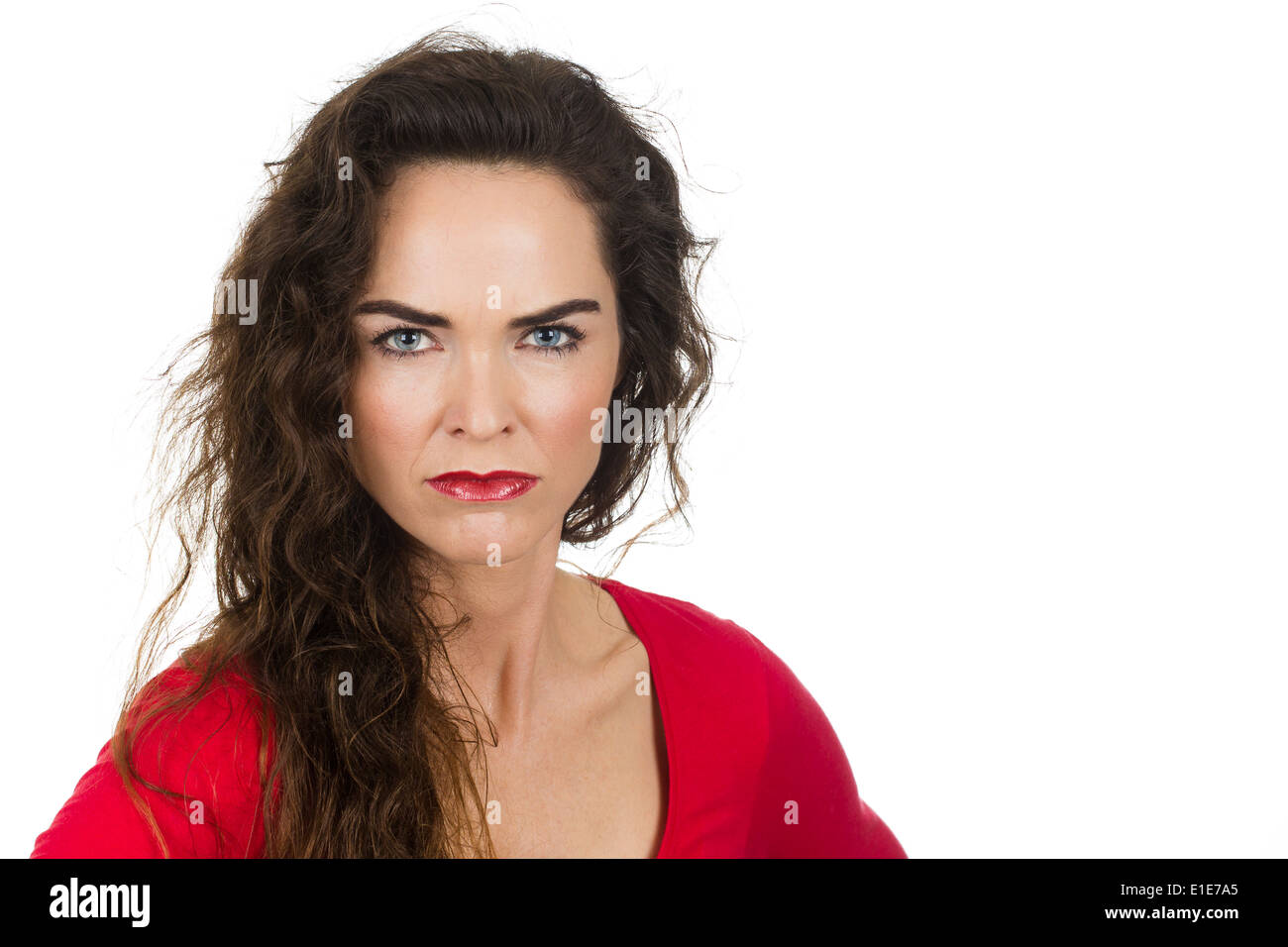 A very annoyed angry and irritated woman. Isolated on white. Stock Photo