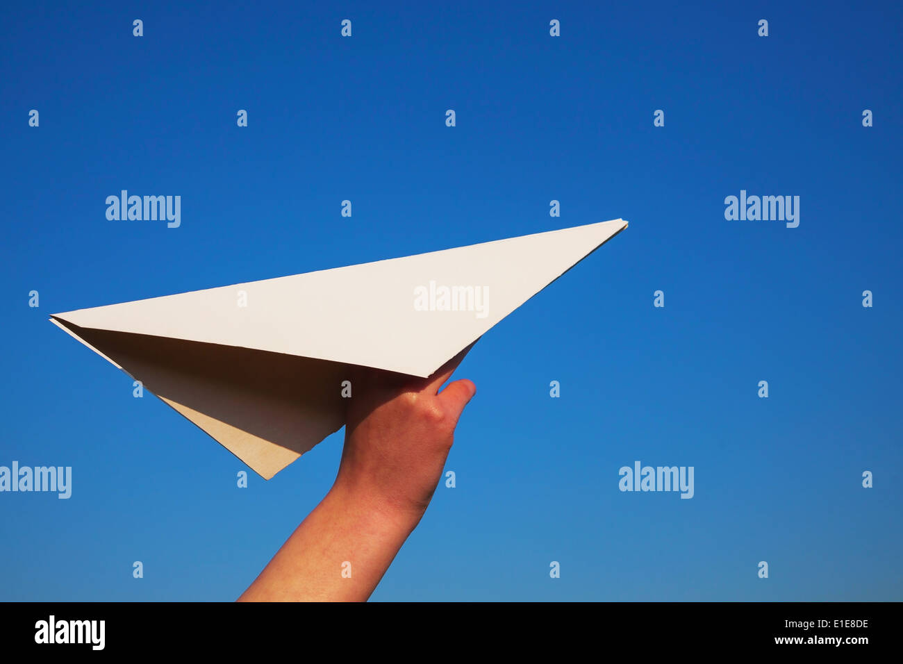 Better Life Sign on white paper. Man Hand Holding Paper with text. Isolated  on sky background Stock Photo - Alamy