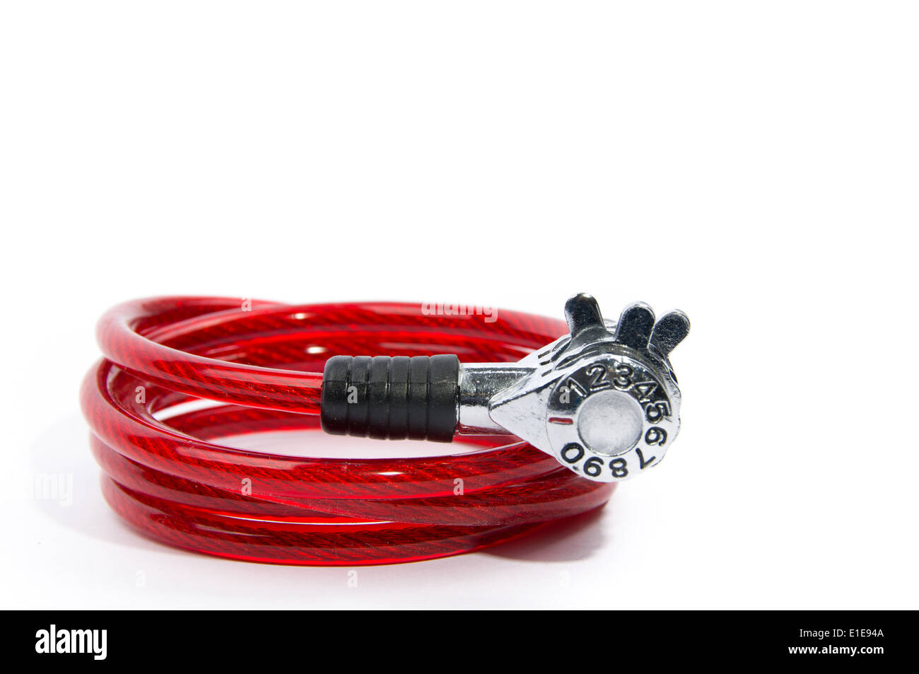 Red numeric combination bicycle lock on isolated white background Stock Photo