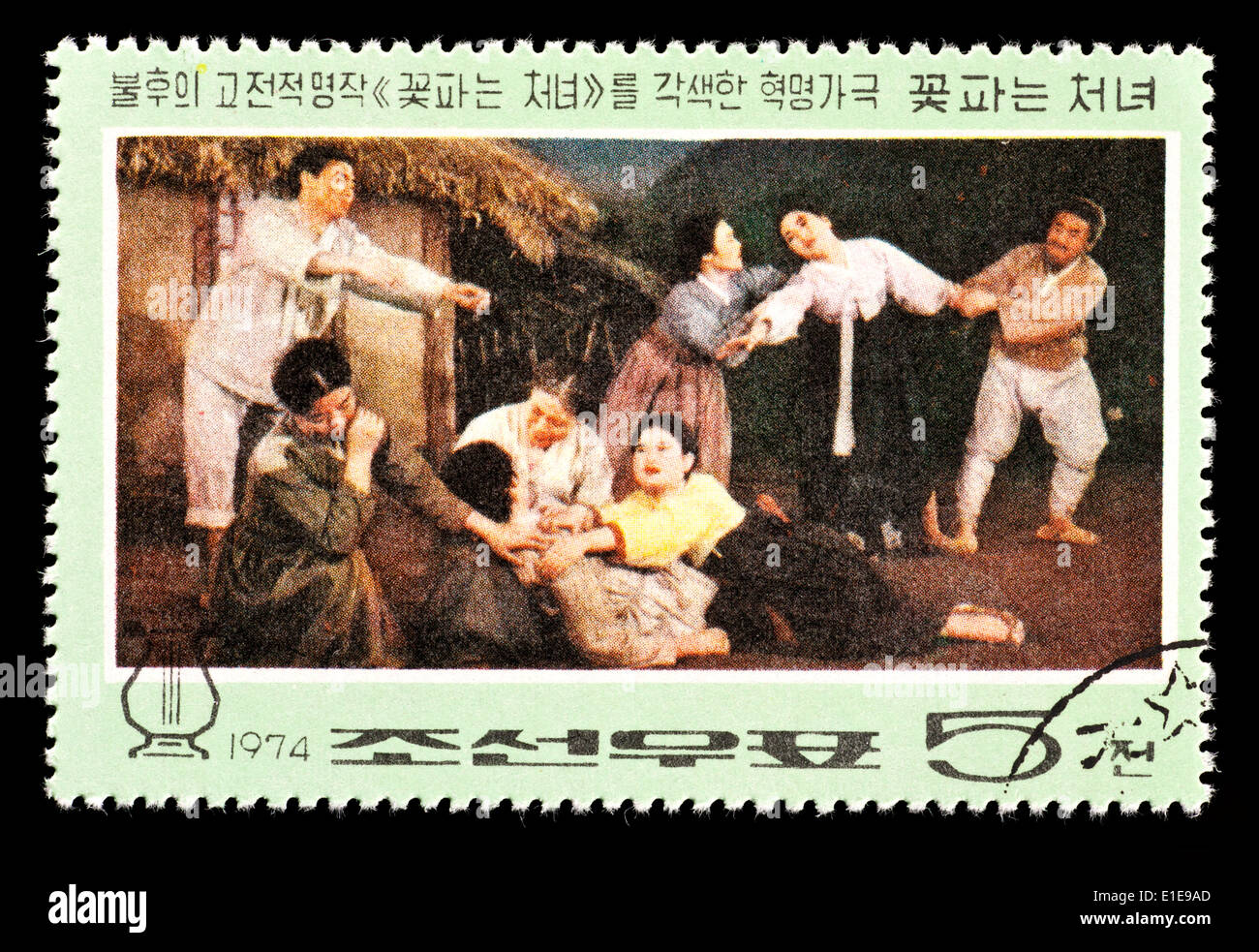 Postage stamp from North Korea depicting a scene from the opera 'The Flower Girl' (death of Kkot Pun's mother). Stock Photo