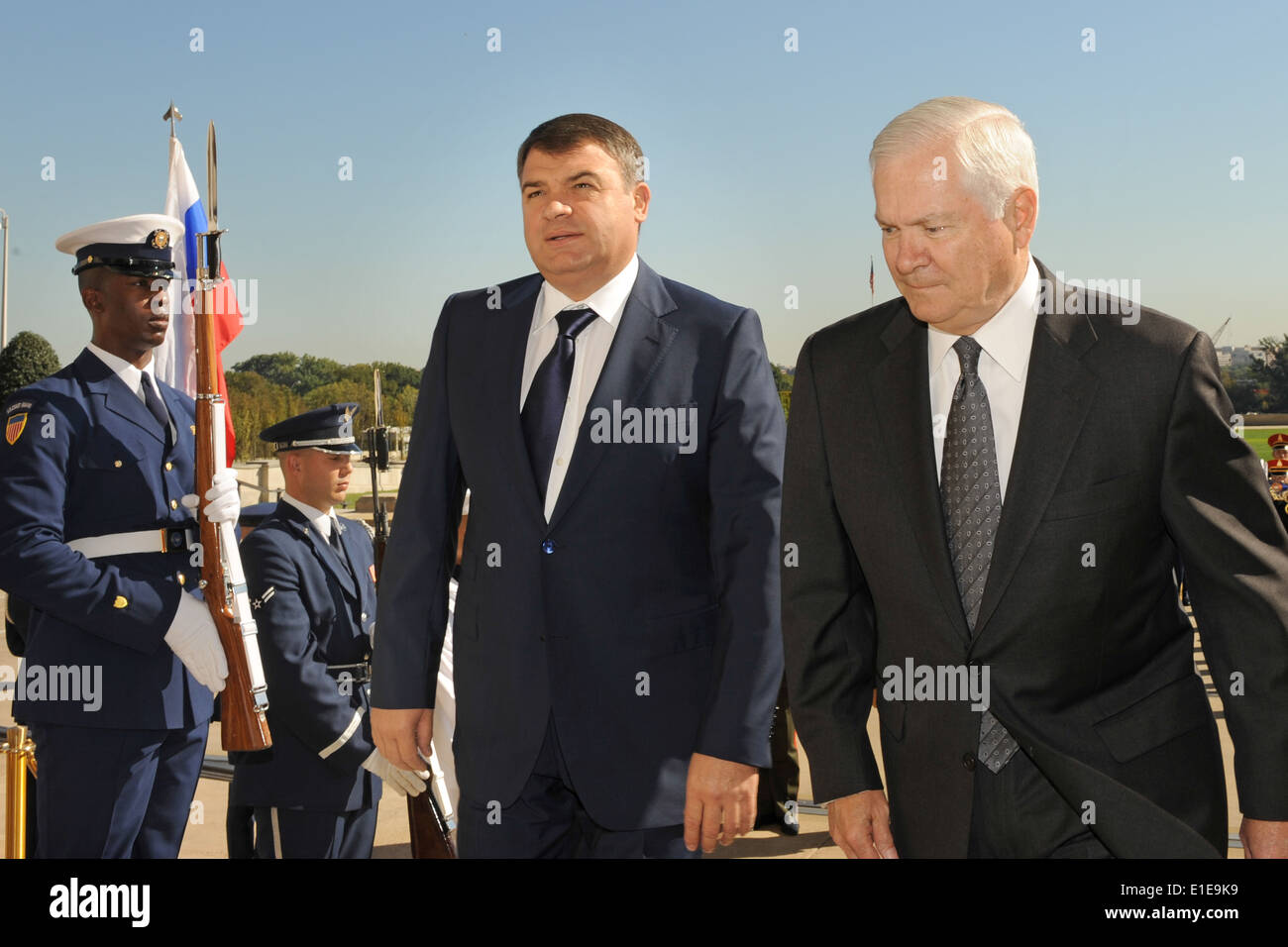 Russian Defense Minister Anatoly Serdykov, center, is escorted into the Pentagon by Secretary of Defense Robert M Gates, right, Stock Photo