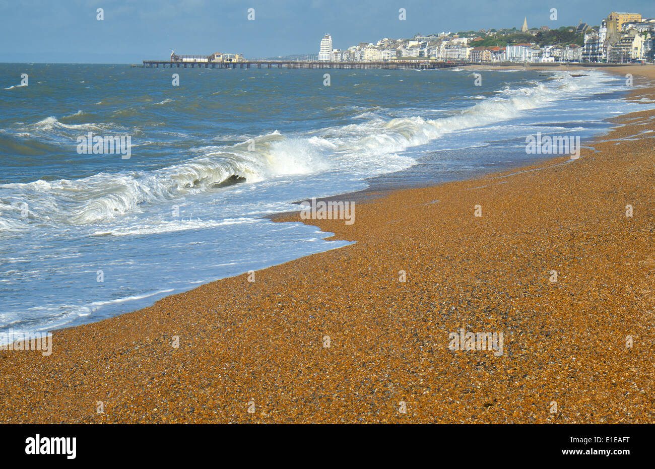 Surf breaking on Hastings beach, East Sussex, England GB, UK Stock