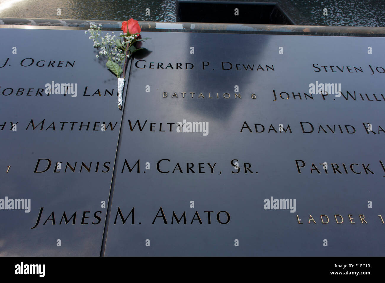 Detail of names of victims at the 9/11 Memorial in New York, killed at the locations of terrorist attacks on September 11th 2001. The National September 11 Memorial is a tribute of remembrance and honor to the nearly 3,000 people killed in the terror attacks of September 11, 2001 at the World Trade Center site, near Shanksville, Pa., and at the Pentagon, as well as the six people killed in the World Trade Center bombing in February 1993. Stock Photo