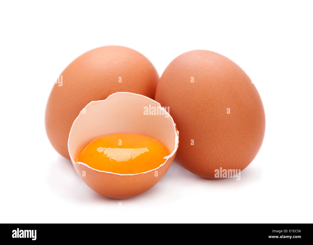 Brown chicken egg with yolk isolated on white Stock Photo