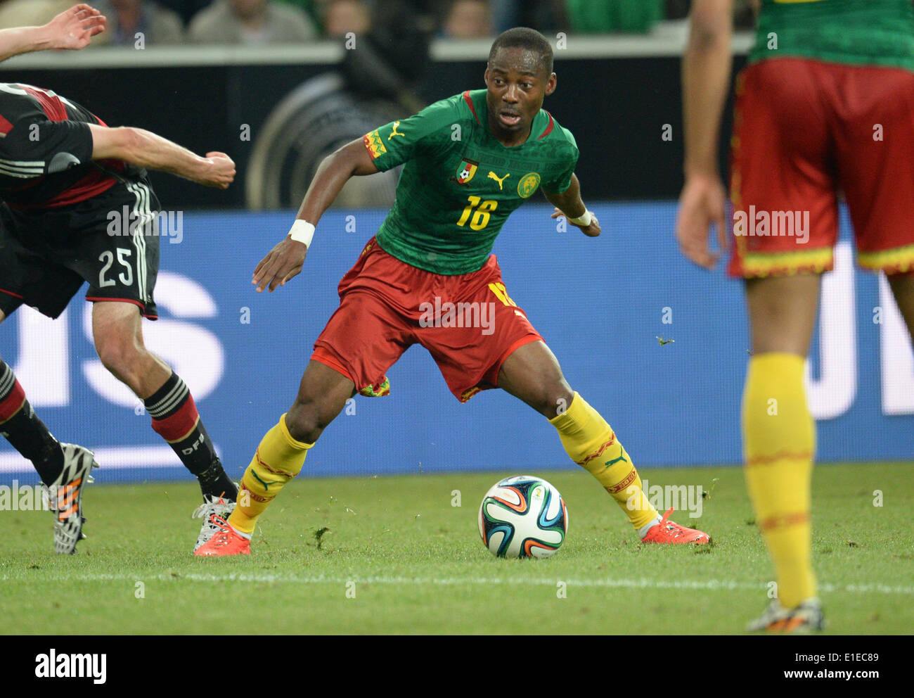 Moenchengladbach, Germany. 01st June, 2014. Cameroon's Enoh Eyong in action during the friendly soccer match between Germany and Cameroon at the Borussia Park stadium in Moenchengladbach, Germany, 01 June 2014. Photo: Bernd Thissen/dpa/Alamy Live News Stock Photo
