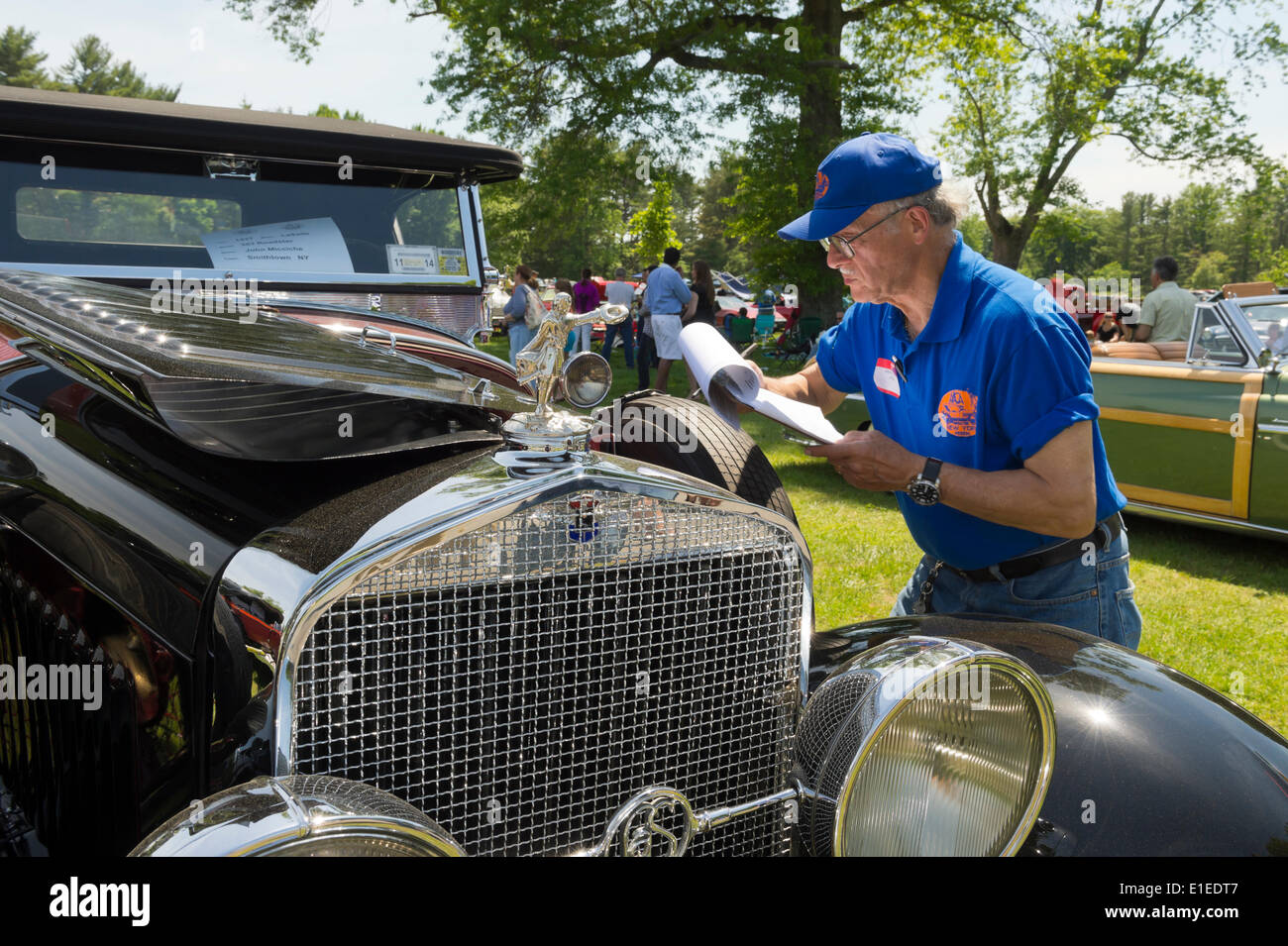 Old Westbury, New York, USA. 01st June, 2014. A judge evaluates a red