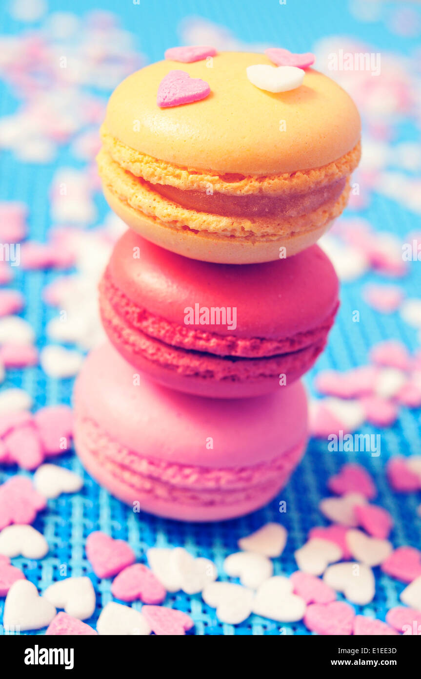 some appetizing macarons of different flavors, with a retro filter effect Stock Photo
