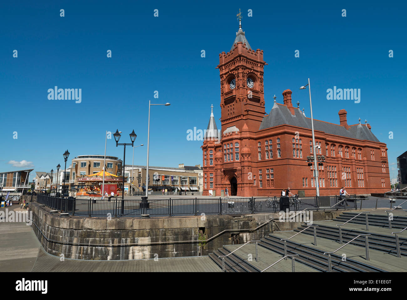 Blue skies over The Pierhead Building and Mermaid Quay, left, Cardiff Bay, South Wales, UK. Stock Photo