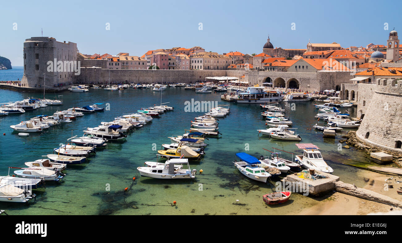Boats and castle walls, Dubrovnik, Croatia. Stock Photo