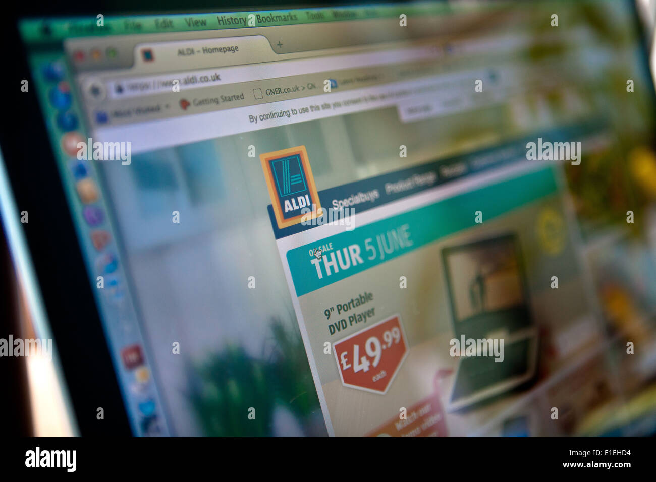 Laptop computer screen showing website of ALDI supermarket Stock Photo