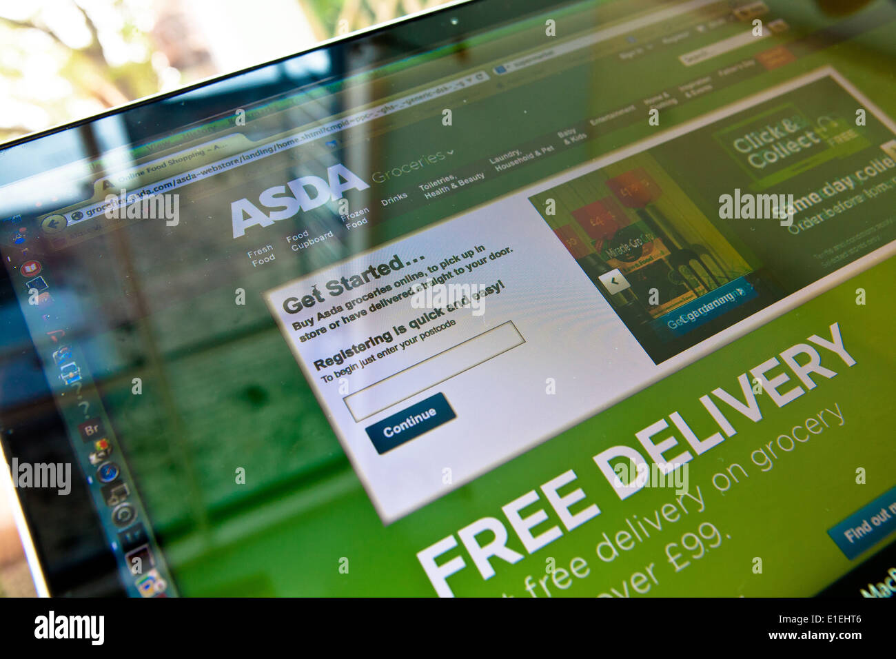 Laptop computer showing the web site for ASDA supermarket Stock Photo