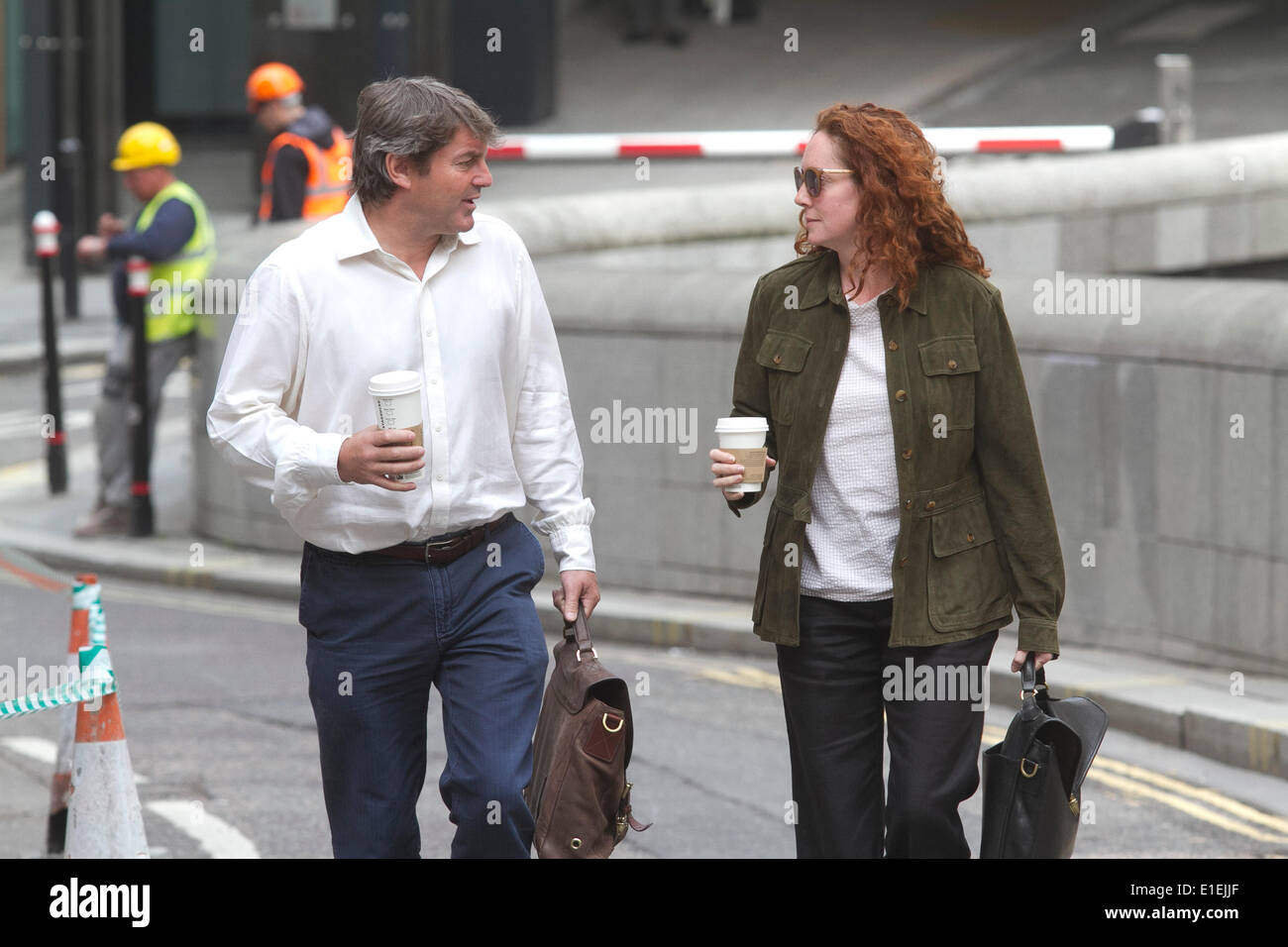 London UK. 2nd June 2014. Former News of the World editor Rebekah Brooks arrives at the the Old Bailey  with husband Charles as the hacking trial continues. Rebekah Brooks and  seven other defendants including Husband Charlie Brooks, Ian Edmonson, Stuart Kuttner,Clive Goodman,Cheryl Carter and Mark Hanna face charges related to allegations of conspiracy to intercept communications and voice mail of well know people including that of murder victim Milly Dowler Credit:  amer ghazzal/Alamy Live News Stock Photo