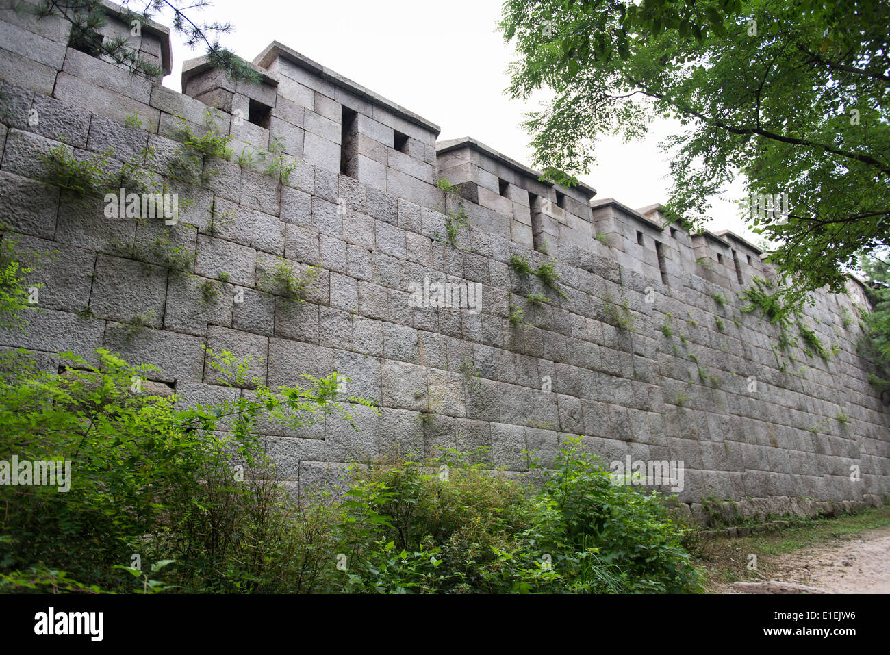 Fortress wall north of Seoul in South Korea with big stone quaders Stock Photo