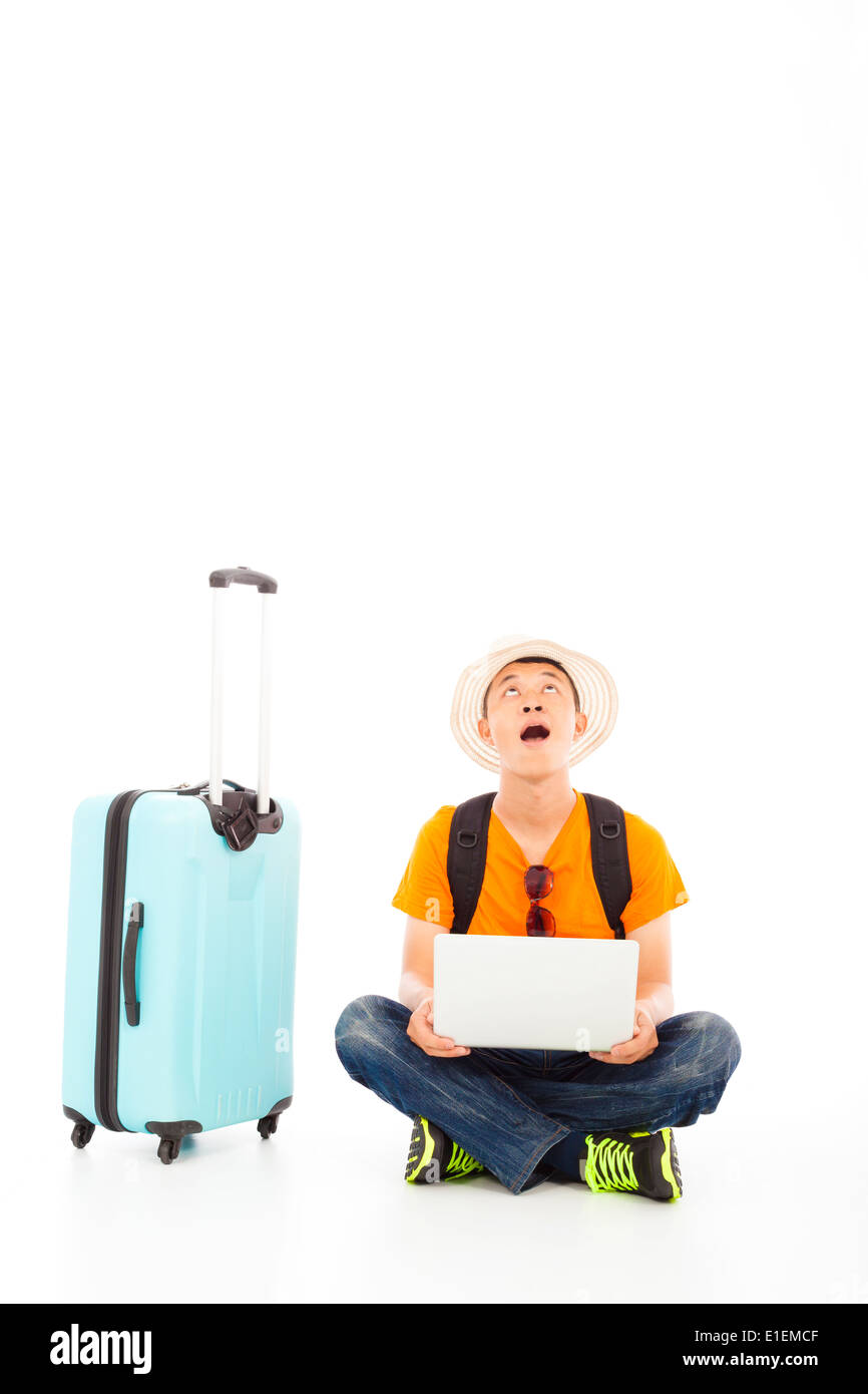 young backpacker surprised to look up Stock Photo