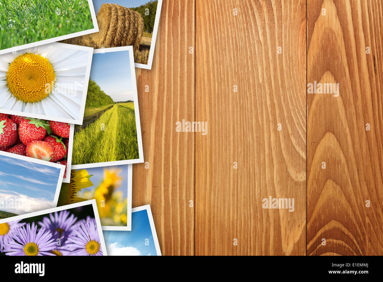 Stack of printed pictures collage on wooden table with copy space for your text or photo Stock Photo