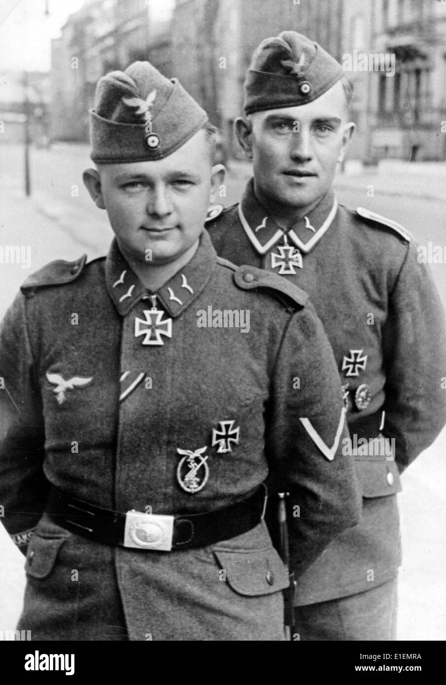 The picture from Nazi news reporting shows two anti-aircraft soldiers of the German Wehrmacht (armed forces) wearing their the Knight's Cross of the Iron Cross in April 1942. The Knight's Cross was awarded more than 7,000 times. Photo: Berliner Verlag/Archive -NO WIRE SERVICE- Stock Photo