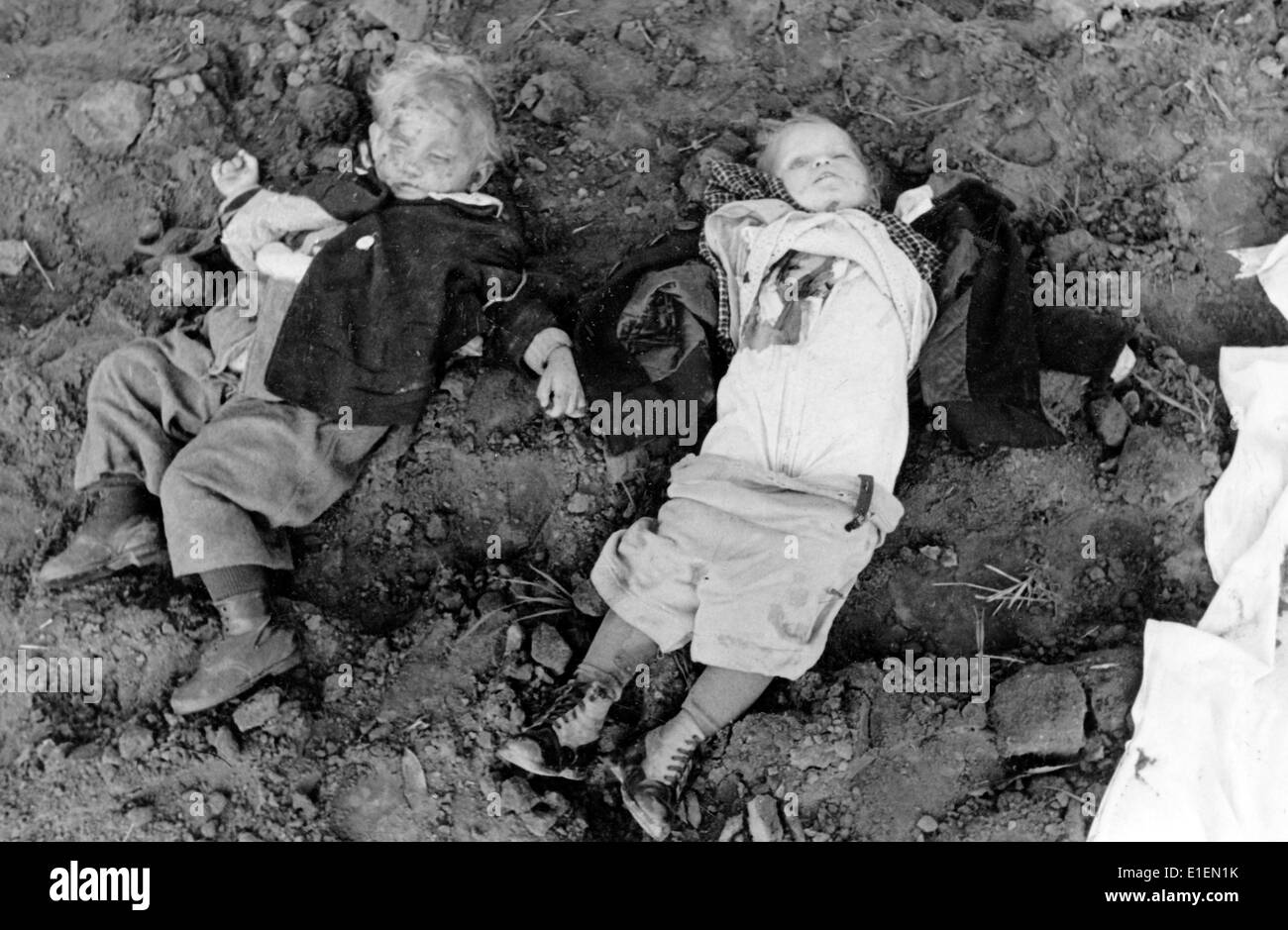 The Nazi Propaganda image shows two children killed in the Nemmersdorf massacre in Nemmersdorf (today Mayakovskoye, Russia) in October 1944. The Nemmersdorf massacre took place on 21 October 1944 in the then German village Nemmersdorf. According to current findings up to 30 people were killed as the Red Army advanced into the town. Even today the circumstances are still unclear. A translation of the German original Nazi news report on the back of the image reads: Soviet crimes in re-liberated East Prussian towns! As the report by the Supreme Command of the Armed Forces (OKW) says, German count Stock Photo
