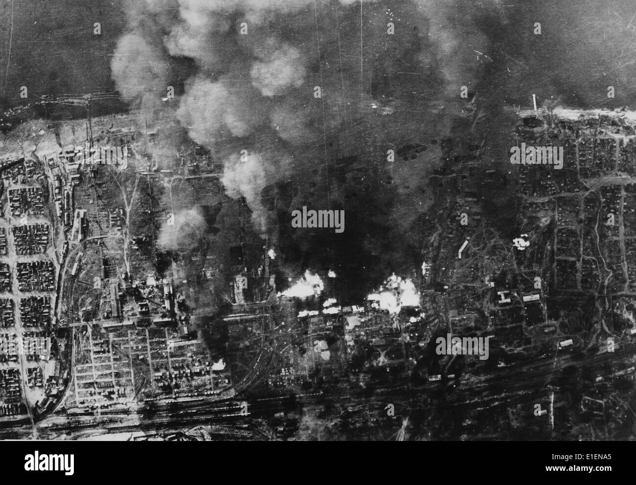German bomb attack on Stalingrad (today Volgograd) in September 1942. The original Nazi propaganda text on the back side of the picture reads: 'Bomb on Stalingrad. Violent clouds of smoke over the Volga from the fires in Stalingrad's arms factories.' Fotoarchiv für Zeitgeschichtee - NO WIRE SERVICE Stock Photo
