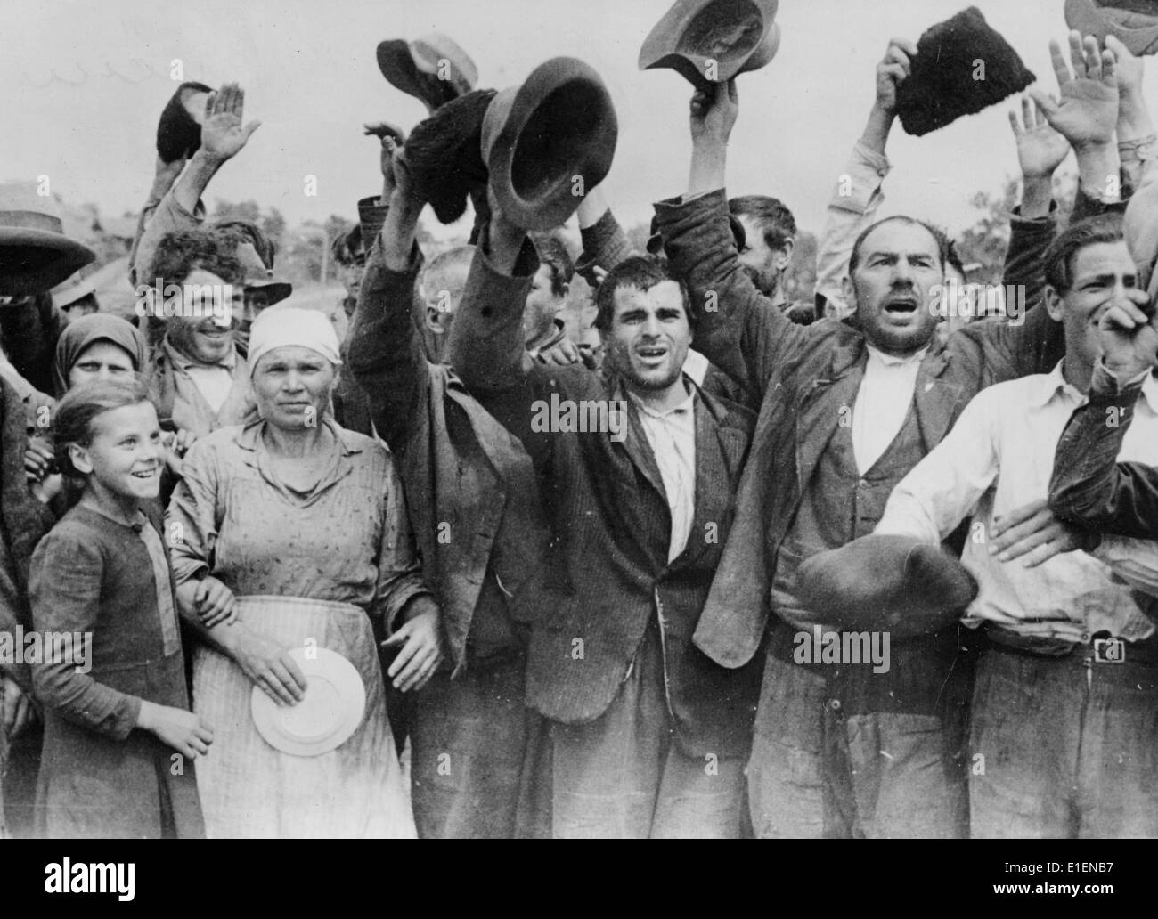 German soldiers are greeted by locals as they march into Soviet occupied Bessarbia (Romania) in 1941. The original Nazi propaganda text on the back side of the picture reads: 'Joy and relief beams from the eyes of Bessarbian residents. In Bessarbian towns, which have been occupied by our troops, young and old overflowing with gratitude hurried out to greet German soldiers as liberators after a year under the Soviet dictatorship. Fotoarchiv für Zeitgeschichtee - NO WIRE SERVICE Stock Photo