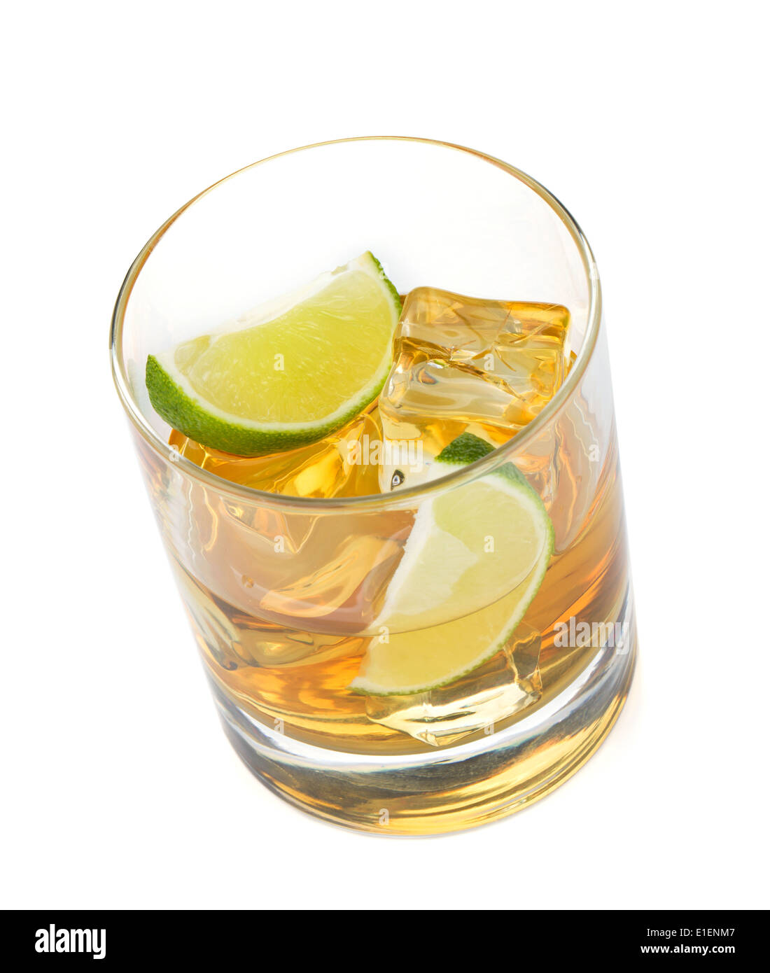 Whiskey cocktail with lime. Isolated on white background Stock Photo - Alamy