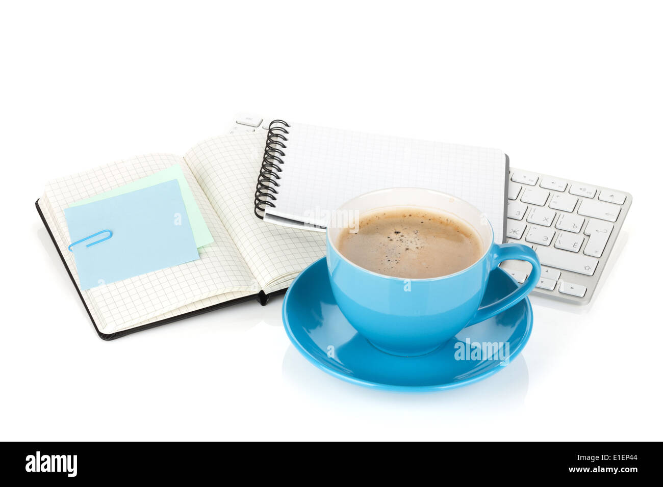 Blue coffee cup and office supplies. Isolated on white background Stock ...