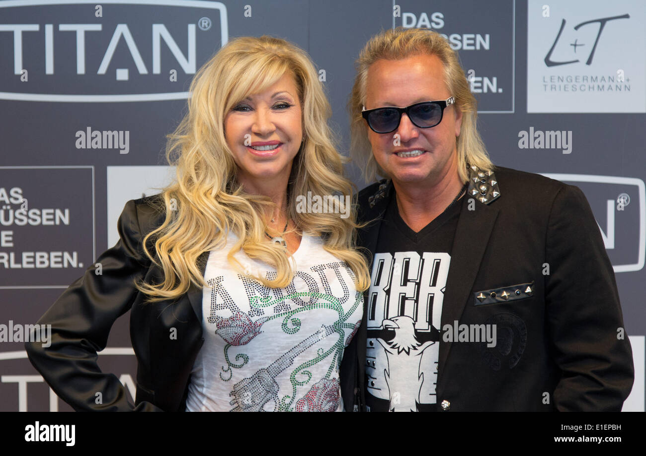 Osnabrueck, Germany. 02nd June, 2014. Entrepreneur Robert Geiss and his  wife Carmen pose during the opening of their Titan luggage shop at fashion  boutique Modehaus L T in Osnabrueck, Germany, 02 June