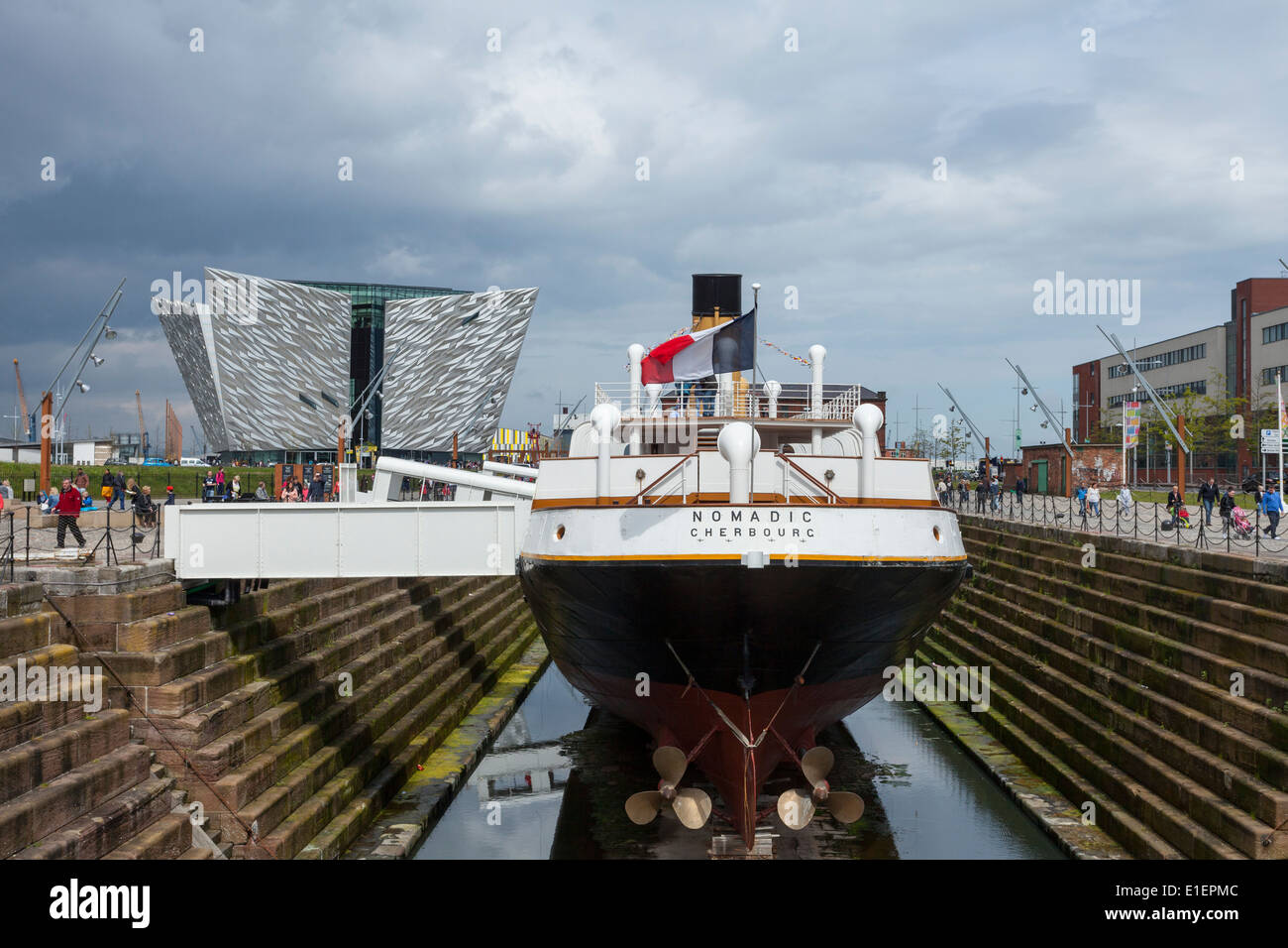 SS Namadic, tender to the liner Titanic in Hamilton Dock, Belfast, Northern Ireland. Titanic Building in background Stock Photo